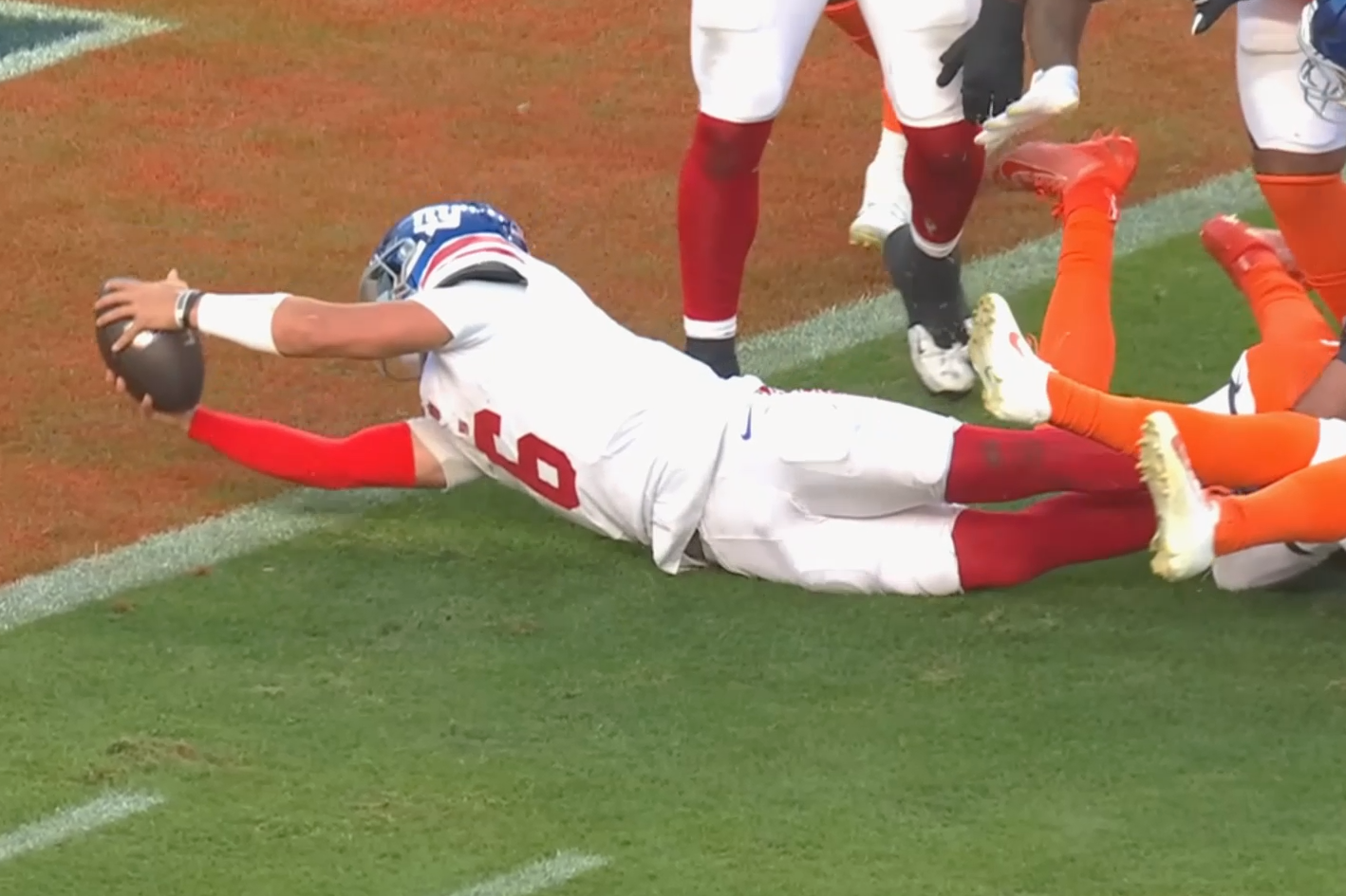 25 Week 7 NYG DEN Jaxson Dart knee down ball hovering